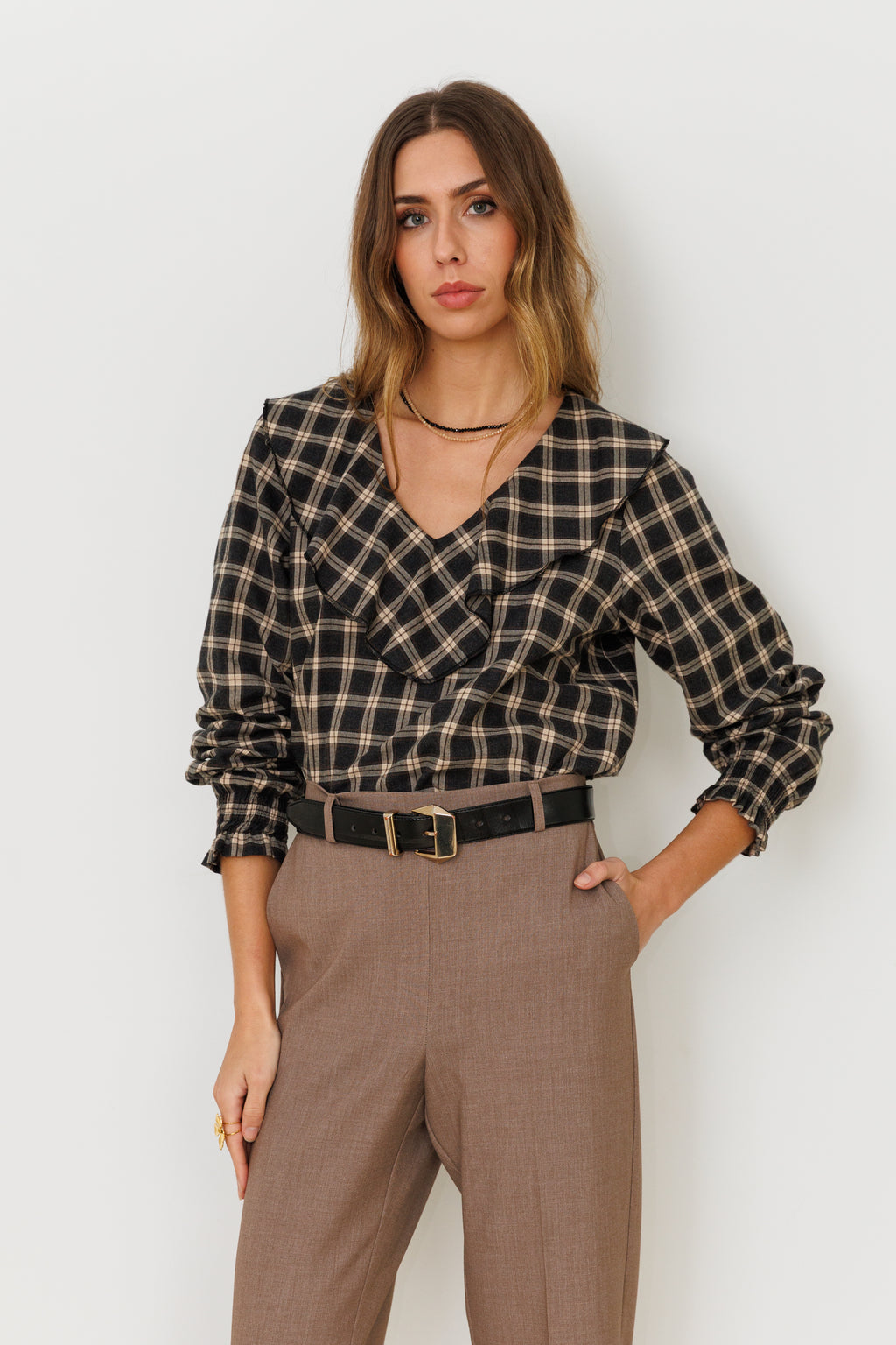 Blusa con volante