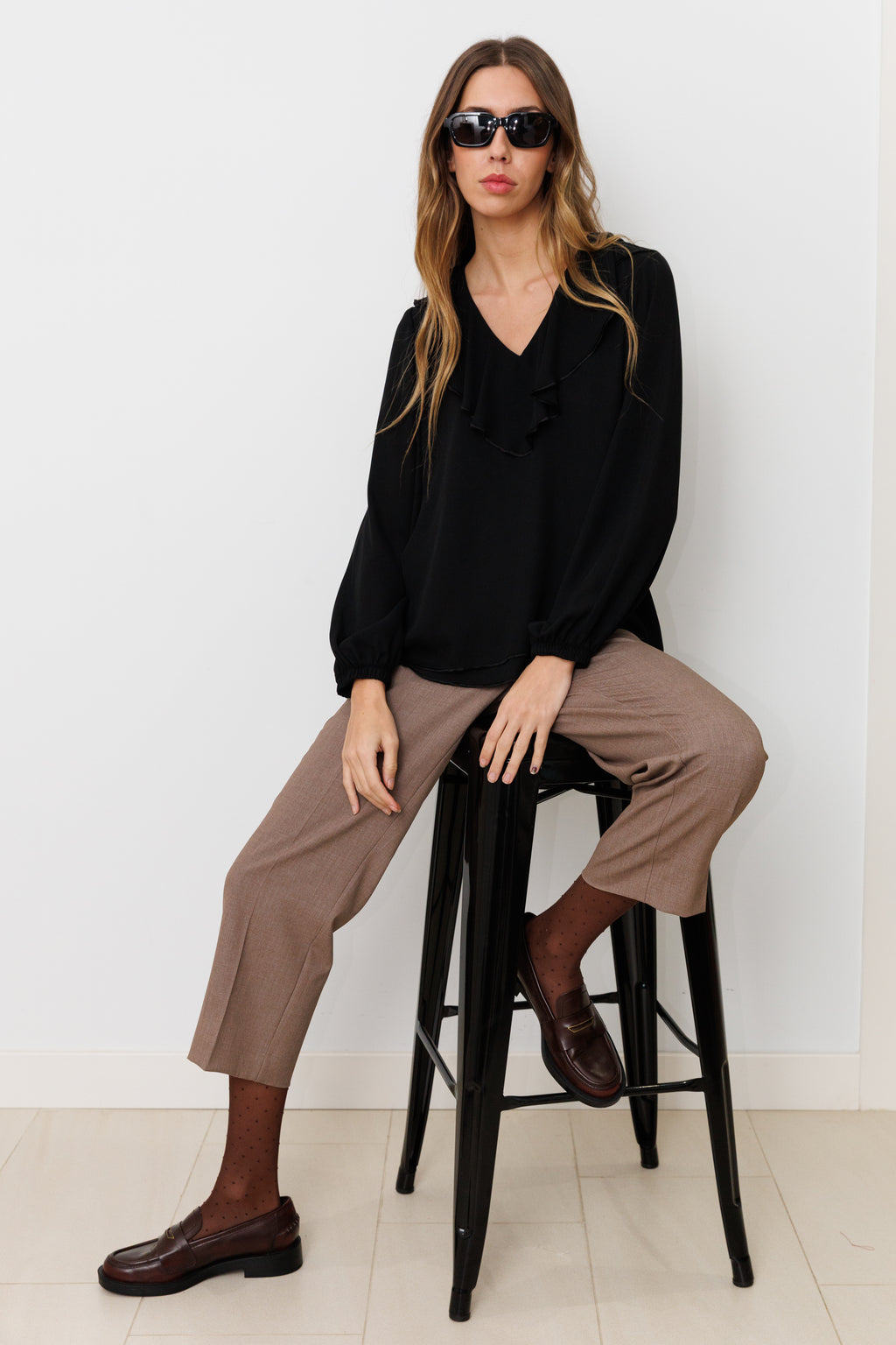 Blusa con volante