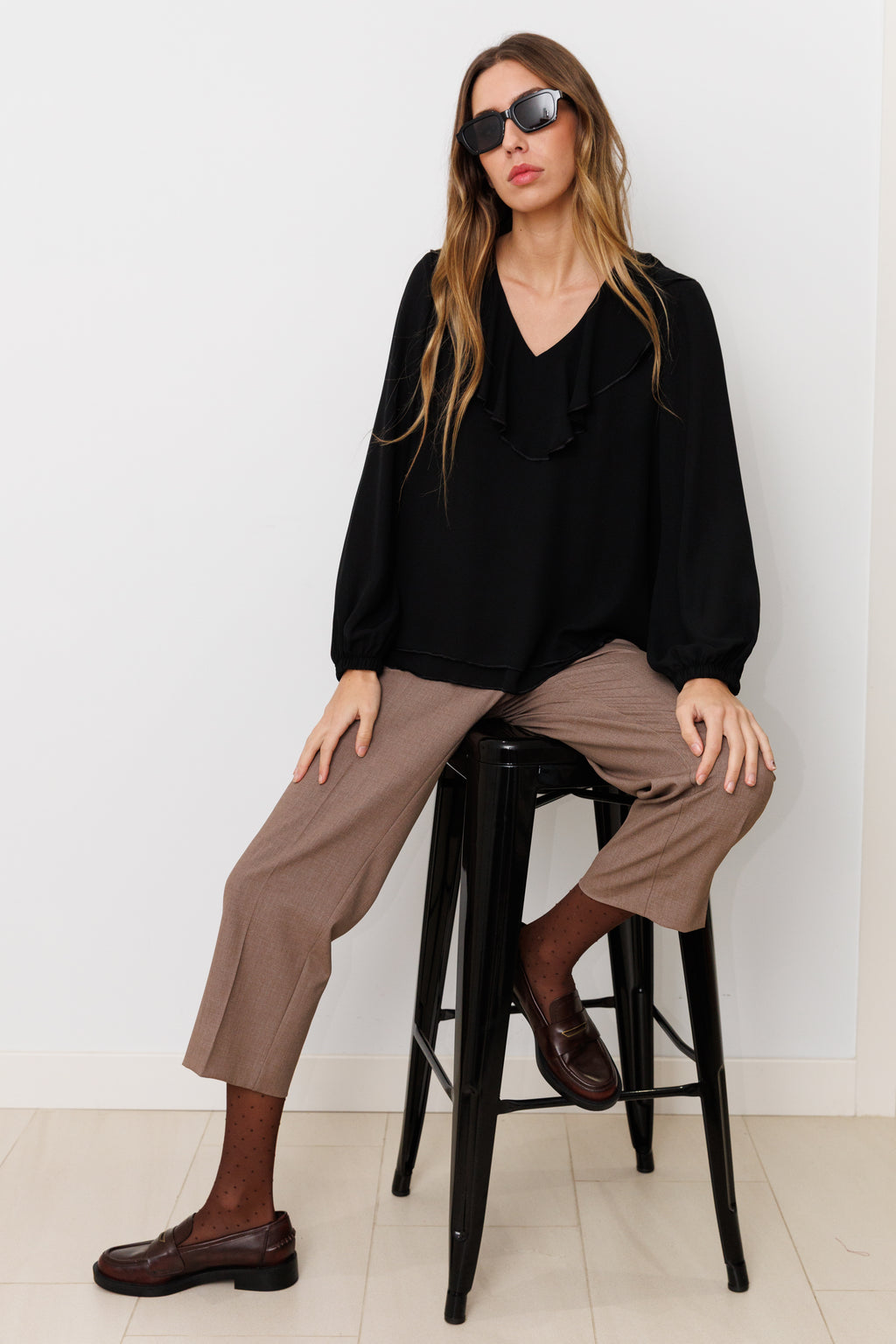 Blusa con volante