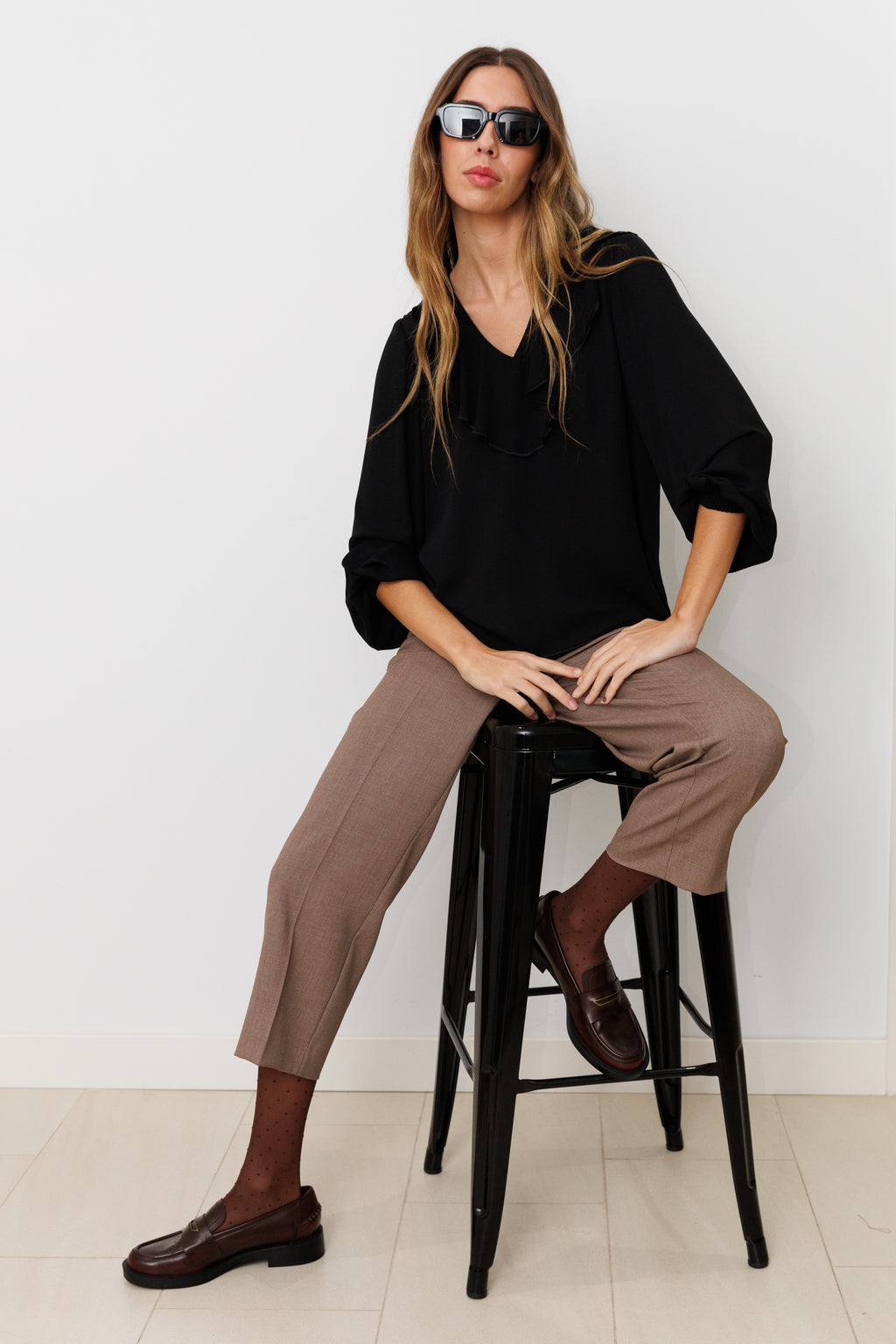 Blusa con volante