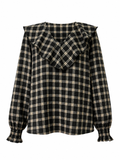 Blusa con volante